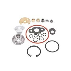 Engine repair kit with gaskets, seals, and metal parts for engine maintenance.
